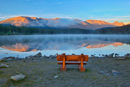 Picture of CANADA-ALBERTA-JASPER NATIONAL PARK BENCH OVERLOOKING LAKE AND MOUNTAINS AT SUNSET