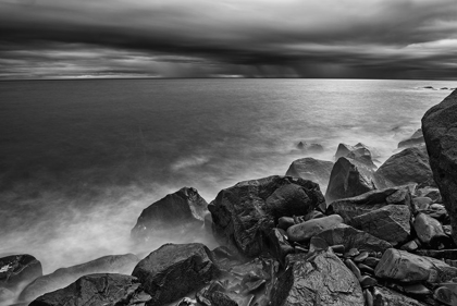 Picture of CANADA-QUEBEC-RUISSEAU CASTOR SHORELINE ROCKS ON GULF OF ST LAWRENCE IN STORM LIGHT