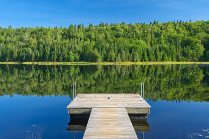 Picture of CANADA-QUEBEC-LA MAURICIE NATIONAL PARK TREE REFLECTION AND DOCK IN LAC MODENE