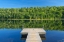 Picture of CANADA-QUEBEC-LA MAURICIE NATIONAL PARK TREE REFLECTION AND DOCK IN LAC MODENE