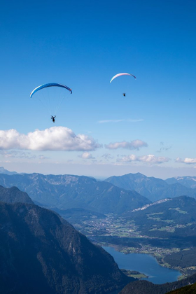 Picture of AUSTRIA-DACHSTEIN-PARAGLIDERS AS THEY SOAR ABOVE LAKE HALLSTATT AND THE SURROUNDING MOUNTAINS