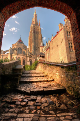 Picture of AN ARCH LEADS TO A CHURCH IN BRUGES-BELGIUM