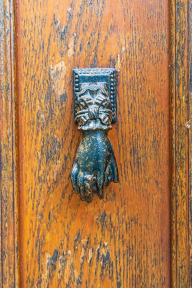 Picture of FRANCE-DORDOGNE-HAUTEFORT A METAL DOOR KNOCKER IN THE SHAPE OF A HAND IN THE TOWN OF HAUTEFORT