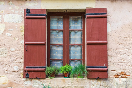 Picture of FRANCE-DORDOGNE-HAUTEFORT A BROWN SHUTTERED WINDOW ON A HOUSE IN THE TOWN OF HAUTEFORT
