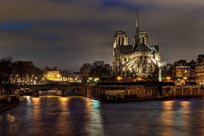 Picture of NOTRE DAME CATHEDRAL AND THE SEINE RIVER SHIMMER IN THE PARIS-FRANCE NIGHT