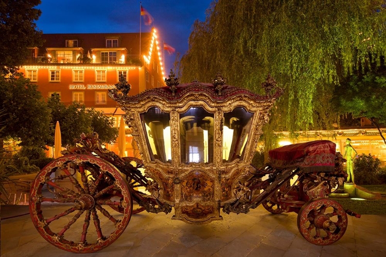 Picture of GERMANY-LINDAU ISLAND-LAKE CONSTANCE VICTORIAN ORNATE CARRIAGE IN FRONT OF HOTEL AT NIGHT