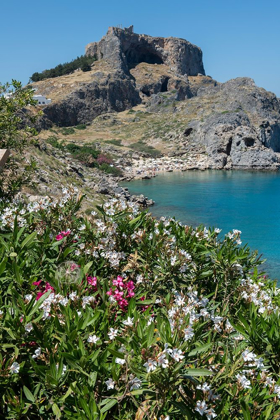 Picture of ST PAULS BAY WITH THE ACROPOLIS OF LINDOS IN THE DISTANCE WITH THE TEMPLE OF ATHENA LINDIA
