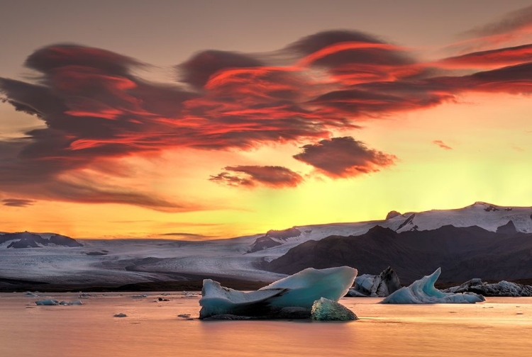 Picture of ICEBERGS FROM THE JOKULSARLON GLACIER ADRIFT IN SUNSET IN JOKULSARLON LAGOON IN ICELAND