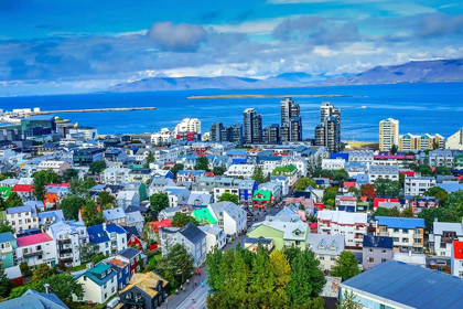 Picture of COLORFUL RED GREEN BLUE HOUSES APARTMENT BUILDINGS CARS BUS STREETS OCEAN-REYKJAVIK-ICELAND
