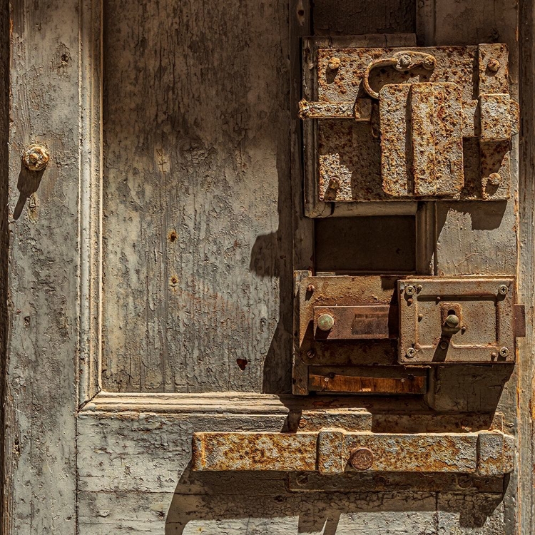 Picture of ITALY-APULIA-METROPOLITAN CITY OF BARI-GIOVINAZZO OLD WOODEN DOOR WITH MASSIVE RUSTED METAL LOCKS