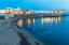 Picture of ITALY-APULIA-PROVINCE OF LECCE-GALLIPOLI BEACH AND OLD TOWN SECTION OVER THE IONIAN SEA AT DUSK