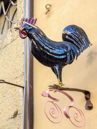 Picture of ITALY-CHIANTI ROOSTER WITH GLASSES ABOVE A SHOP IN RADDA IN CHIANTI