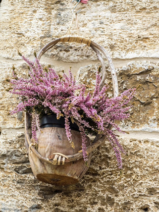 Picture of ITALY-CHIANTI BASKET OF FLOWERS HANGING ON A STONE WALL