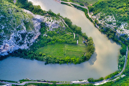 Picture of ITALY-ADIGE RIVER BEND AND VINEYARDS