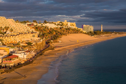 Picture of CANARY ISLANDS-FUERTEVENTURA ISLAND-MORRO JABLE-HIGH ANGLE VIEW OF PLAYA DE LA CEBADA BEACH-SUNSET