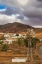 Picture of CANARY ISLANDS-FUERTEVENTURA ISLAND-TOTO-DESERT VILLAGE VIEW WITH WINDMILL