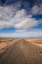 Picture of CANARY ISLANDS-FUERTEVENTURA ISLAND-PUNTO DE PASO CHICO-WEST COAST DESERT LANDSCAPE WITH ROAD