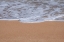 Picture of SEA FOAM ON GOLDEN SANDY BEACH