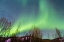 Picture of ALASKA-FAIRBANKS AURORA BOREALIS OVER MOUNTAIN LANDSCAPE