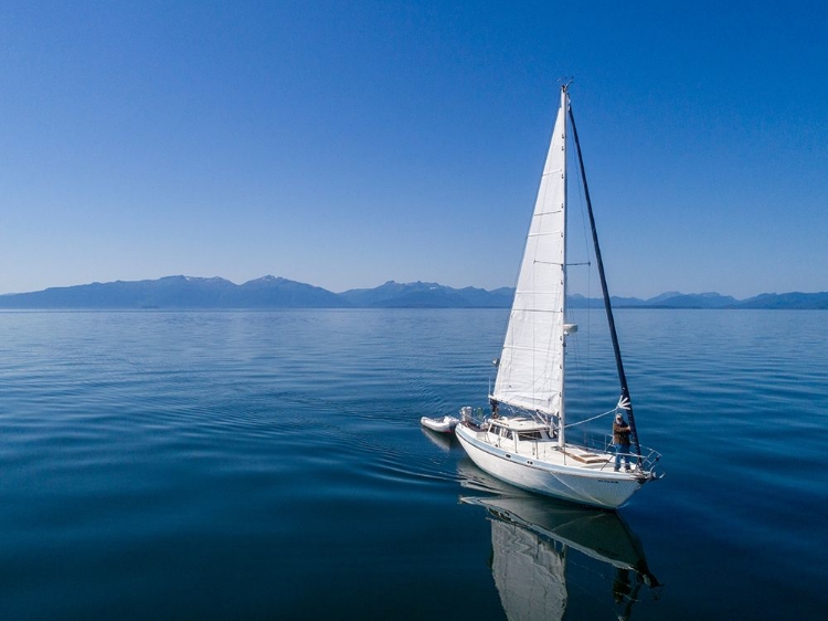 Picture of ALASKA-AERIAL VIEW OF GULF 32 PILOTHOUSE BOAT MOTORING AND SAILING IN CALM WATERS OF FREDERICK SOUND