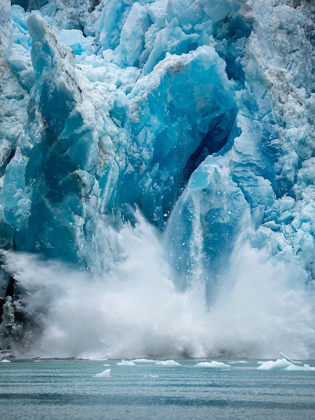 Picture of ALASKA-TRACY ARM-MASSIVE ICEBERG CALVING FROM FACE OF SOUTH SAWYER GLACIER IN TRACY ARM