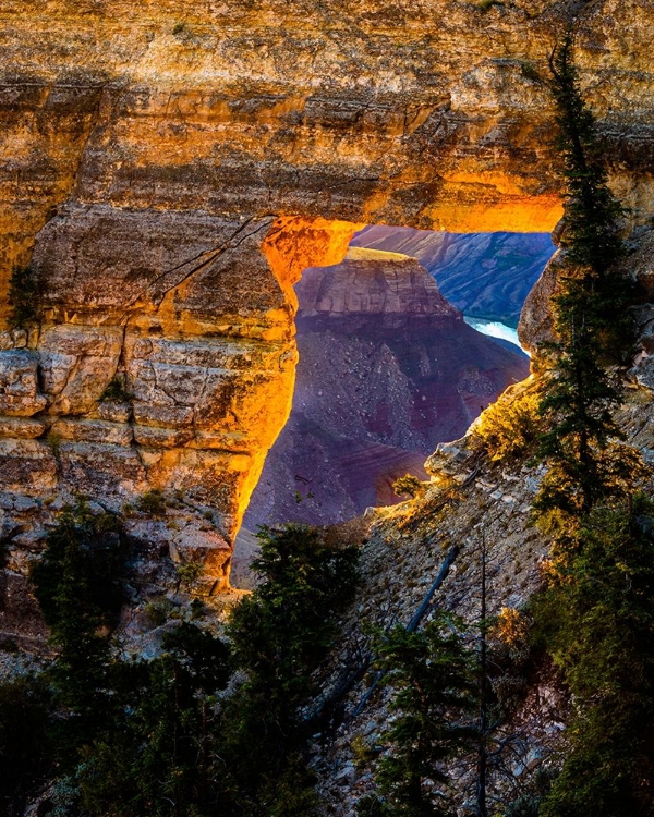 Picture of ARIZONA-GRAND CANYON NATIONAL PARK VIEW THROUGH HOLE IN CANYON WALL AT SUNRISE 