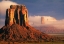 Picture of CLOUDS DANCE IN THE BUTTES IN MONUMENT VALLEY-ON THE ARIZONA-UTAH BORDER