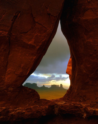 Picture of TEARDROP ARCH FRAMES THE MONUMENT VALLEY ROCK FORMATIONS ON THE UTAH-ARIZONA BORDER