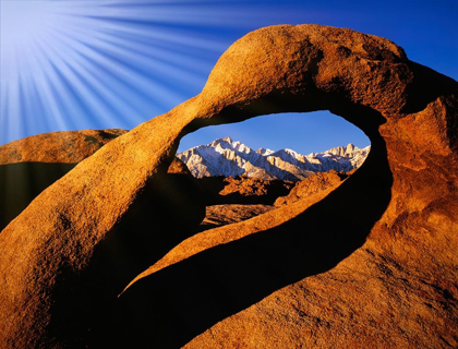Picture of CALIFORNIA-ALABAMA HILLS SUN RAYS AND GRANITE ARCH THAT FRAMES LONE PINE PEAK