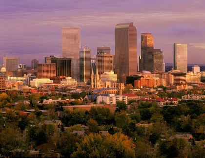 Picture of DENVER-COLORADO SKYLINE GLISTENS IN EARLY MORNING DURING SUNRISE AGAINST THE ROCKY MOUNTAINS