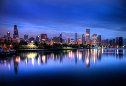 Picture of CHICAGO SKYLINE REFLECTS IN LAKE MICHIGAN DURING A BLUE SUNRISE
