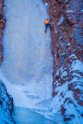 Picture of MINNESOTA-LAKE SUPERIOR CLIMBER SCALING FROZEN WATERFALL ON CLIFF 