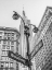 Picture of STREET LAMP AND STREET SIGNS WITH EMPIRE STATE BUILDING IN BACKGROUND - NEW YORK