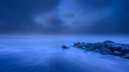 Picture of NEW JERSEY-CAPE MAY NATIONAL SEASHORE FOGGY SUNRISE ON WATER AND ROCKS 