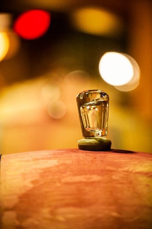 Picture of WASHINGTON STATE-RED MOUNTAIN GLASS BUNG ON A BARREL IN THE COL SOLARE WINERY