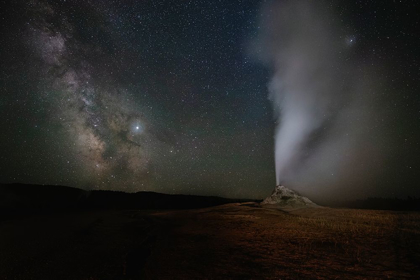 Picture of WYOMING-YELLOWSTONE NATIONAL PARK MILKY WAY ABOVE ERUPTING WHITE DOME GEYSER 