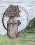 Picture of RUSTED MILK CAN WITH WAGON WHEEL