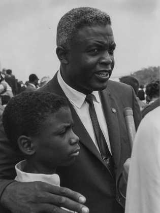 Picture of FORMER NATIONAL BASEBALL LEAGUE PLAYER-JACKIE ROBINSON WITH HIS SON