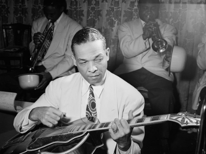 Picture of FRED GUY PLAYING GUITAR AT THE AQUARIUM-NEW YORK 1946