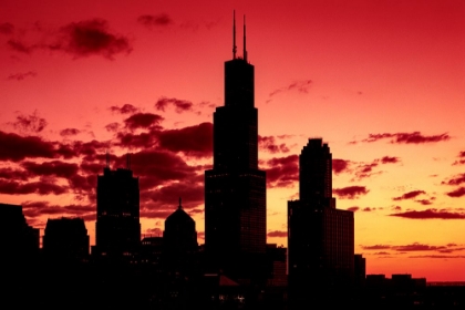 Picture of CHICAGOS SKYLINE APPEARS IN SILHOUETTE AT SUNSET