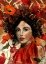 Picture of LADY WITH RED AND ORANGE FLOWERS
