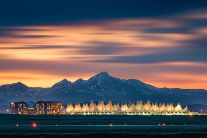 Picture of DENVER INTERNATIONAL AIRPORT IN DUSK WITH LONGS PEAK AS BACKGROUND