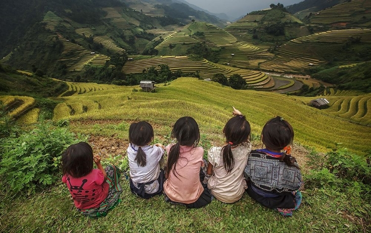 Picture of CHILDREN OF VIETNAM SITTING IN THE BACKYARD THE MOUNTAIN IN MU CANG CHAI,YENBAI,VIETNAM.