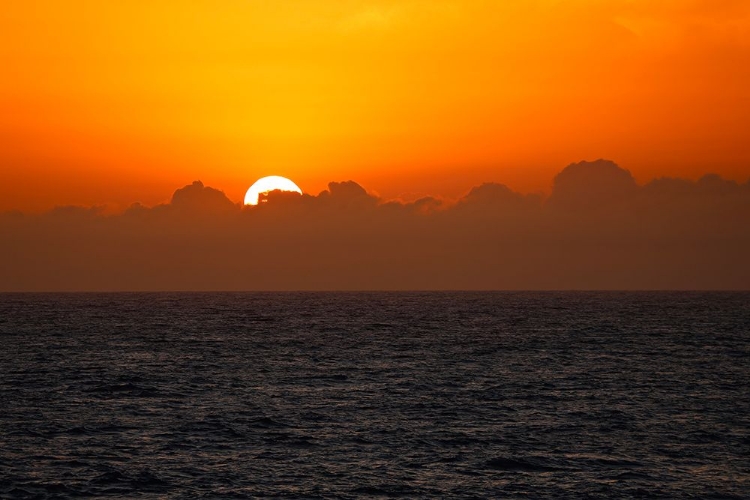 Picture of SUNSET THROUGH THE CLOUDS