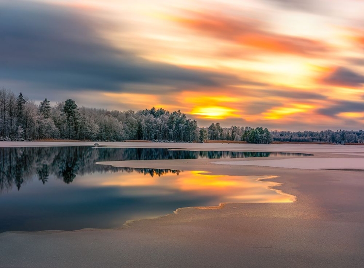 Picture of ICE SLOWLY TAKING OVER THE LAKE