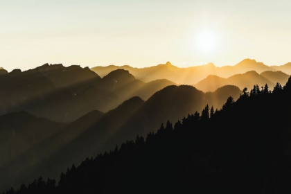 Picture of SUNSET SUN RAYS OVER THE MOUNTAINS