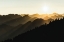 Picture of SUNSET SUN RAYS OVER THE MOUNTAINS