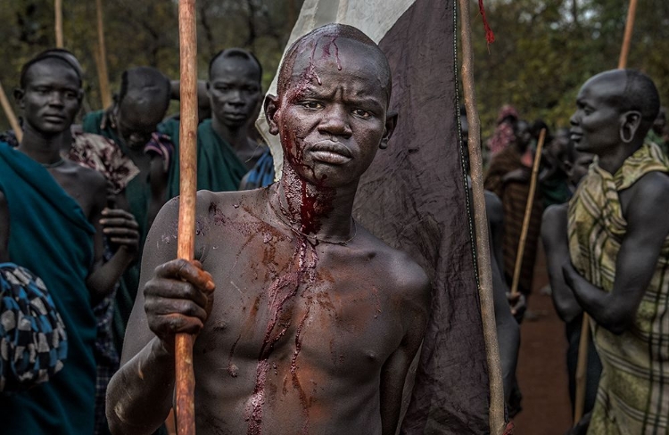 Picture of THE WINNER OF A DONGA FIGHT IN ETHIOPIA.
