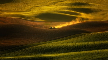 Picture of A TRACTOR IN THE PALOUSE WHEAT FIELDS