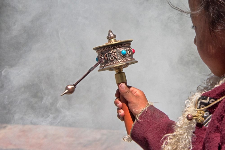 Picture of TIBETAN GIRL-PRAYER WHEEL-DREPUNG MONASTERY-GELUG UNIVERSITY MONASTERIES OF TIBET-LHASA-TIBET-CHINA